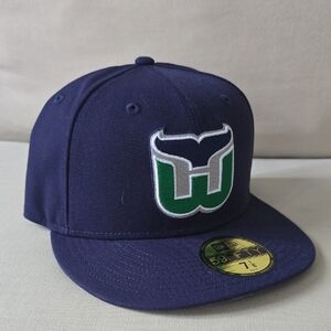 Hartford Whalers New Era Navy Cap with Green and White Emblem